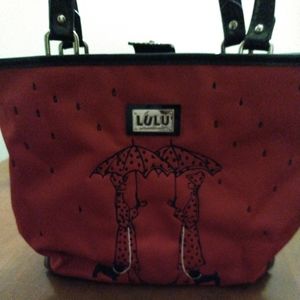 Lulu's red purse and matching wristlet